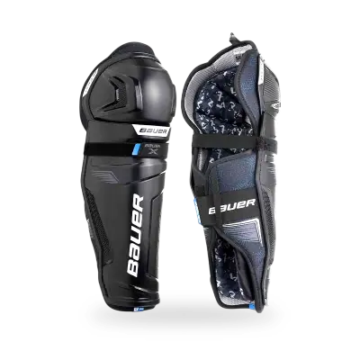 Bauer X Shin Guard shown in lateral profile view, displaying the injected shin cap and segmented calf wrap construction