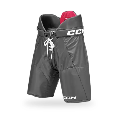 CCM NEXT Junior Hockey Pants in anatomical fit showing molded PE hip caps and sublimated comfort liner interior