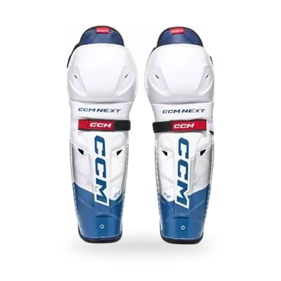 CCM Next Hockey Shin Guards shown front-facing, displaying molded plastic shell, knee cap ventilation ports, and wide calf strap system
