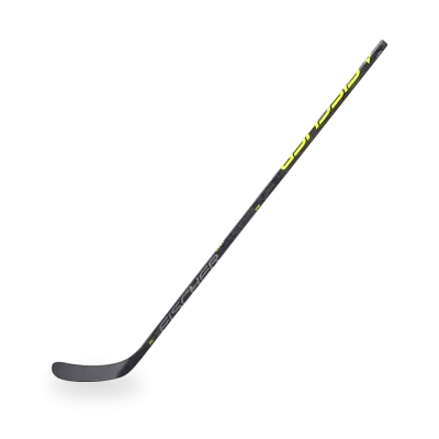 Fischer RC ONE XPro hockey stick showing full carbon shaft, mid-kick profile, and tacky grip finish in side view.