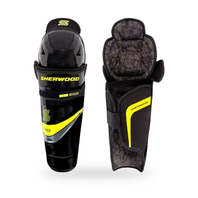 Sherwood Rekker Legend 4 Senior Shin Pads in black and grey colourway showing 3D formed interior liner, anatomical shell profile, and dual-strap retention system, available at T3 Sports India